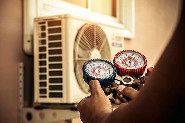 Professional Heat Pump Repair technician working in Union City, IN